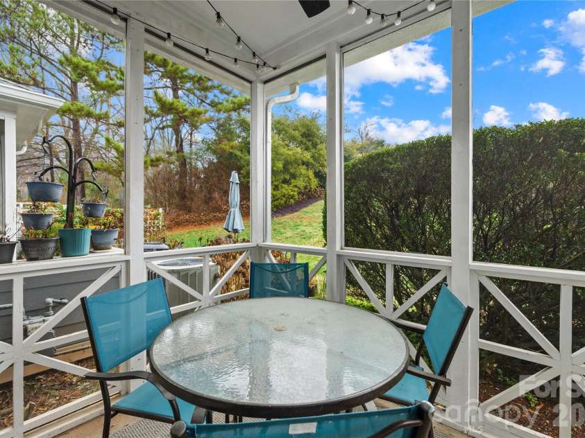 18821 Silver Quay Drive, Cornelius, NC 28031.  MLS# CAR4385275, YatesRealty ID 25590. Great patio for almost year round, comes with table, chairs and lights!