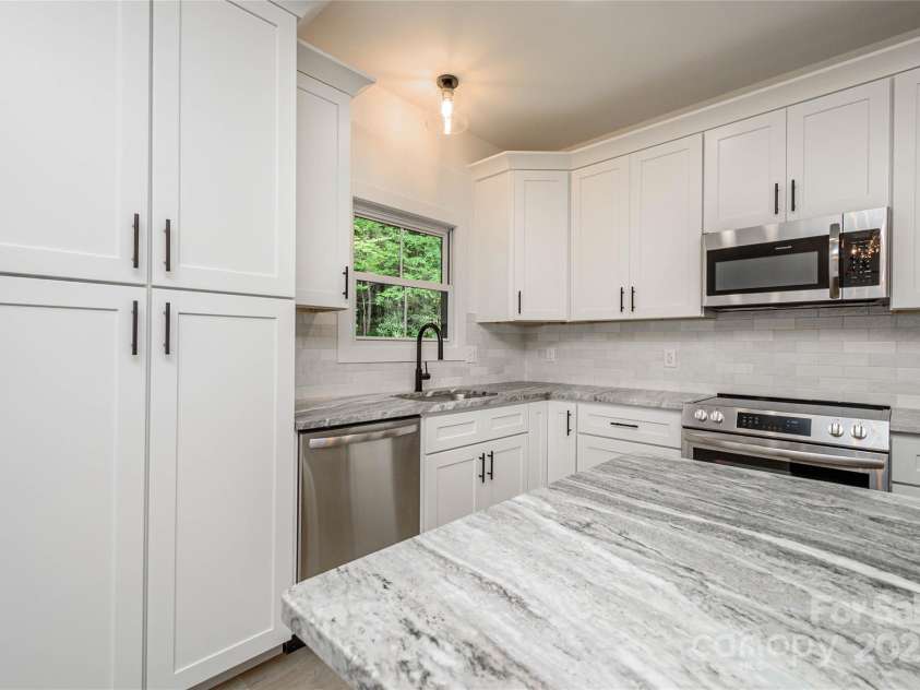 118 Laurel Lane, Etowah, NC 28729.  MLS# CAR4258432, YatesRealty ID 25594. 