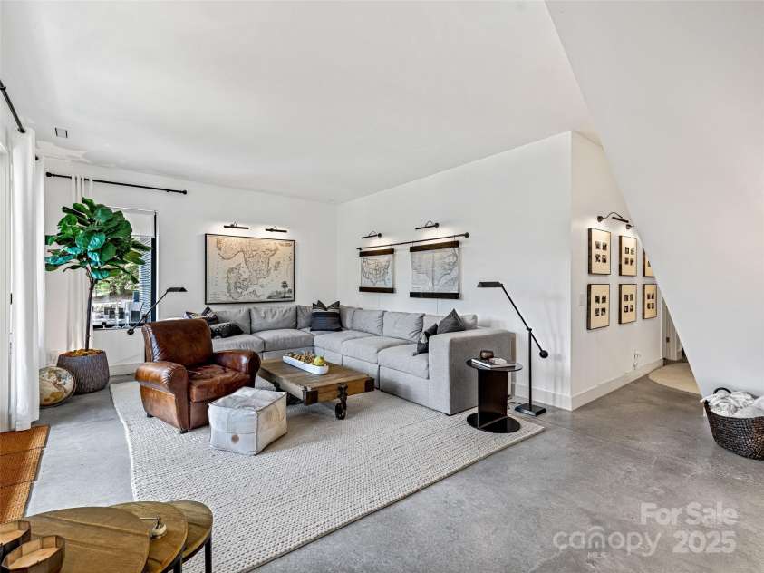 11 Bayonne Trail, Asheville, NC 28804.  MLS# CAR4250937, YatesRealty ID 256. Beautiful decorative concrete floor on the lower level