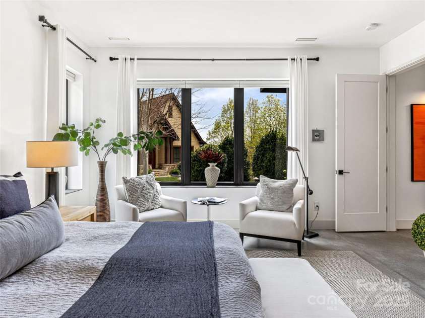 11 Bayonne Trail, Asheville, NC 28804.  MLS# CAR4250937, YatesRealty ID 256. Lovely, large windows throughout this luxury home