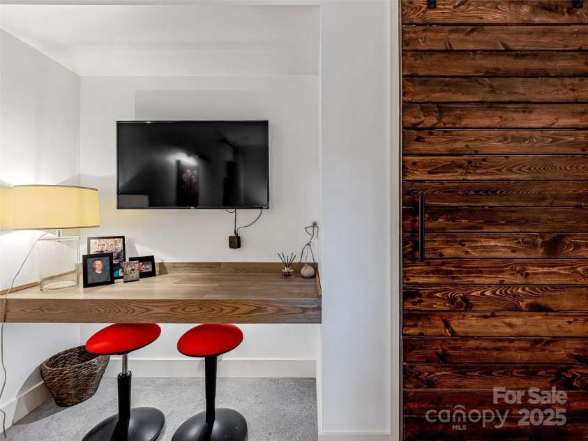 11 Bayonne Trail, Asheville, NC 28804.  MLS# CAR4250937, YatesRealty ID 256. Quaint workspace here