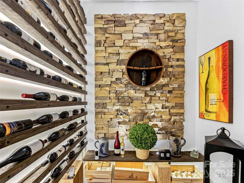 11 Bayonne Trail, Asheville, NC 28804.  MLS# CAR4250937, YatesRealty ID 256. Wine tasting and storage