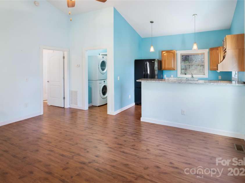 178 Chestnut Walk Drive, Waynesville, NC 28786.  MLS# CAR4227402, YatesRealty ID 2560. Living area into kitchen