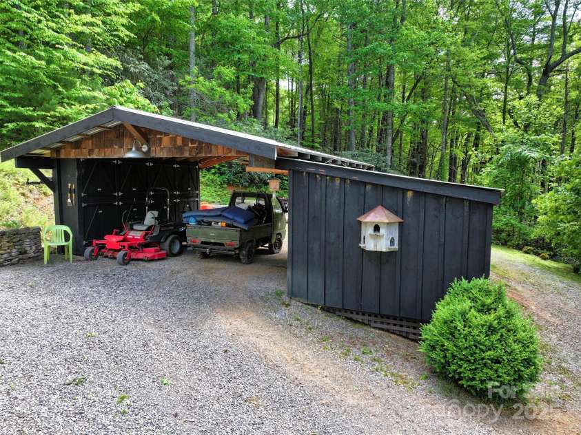 45 Gracious Lane, Waynesville, NC 28785.  MLS# CAR4255270, YatesRealty ID 25600. Carport w Workshop and Storage