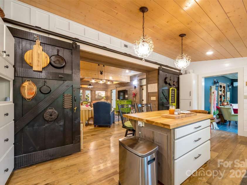 45 Gracious Lane, Waynesville, NC 28785.  MLS# CAR4255270, YatesRealty ID 25600. Choose, either open or closed kitchen w Authentic Barn Doors