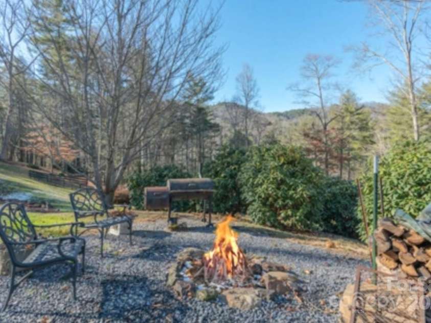 45 Gracious Lane, Waynesville, NC 28785.  MLS# CAR4255270, YatesRealty ID 25600. Fireside Family time w a View