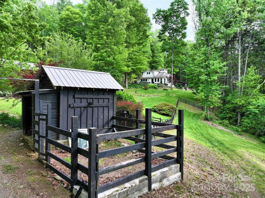 45 Gracious Lane, Waynesville, NC 28785.  MLS# CAR4255270, YatesRealty ID 25600. Potting Shed w Corral