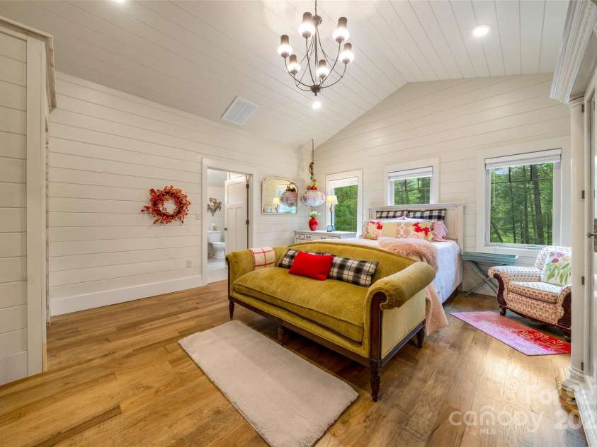 45 Gracious Lane, Waynesville, NC 28785.  MLS# CAR4255270, YatesRealty ID 25600. The Primary Bedroom w Elegant Vaulted Ceilings