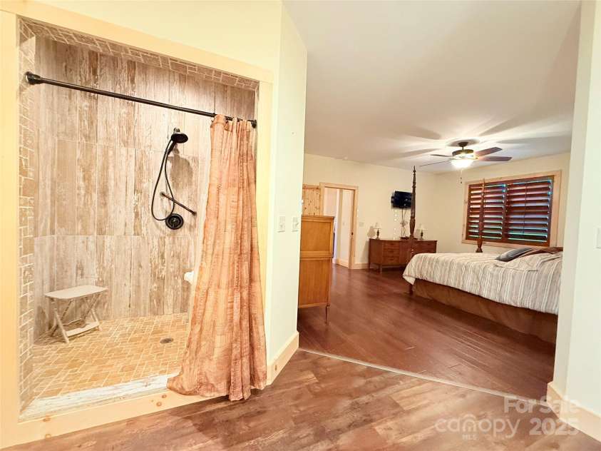 3540 Fork Creek Road, Saluda, NC 28773.  MLS# CAR4294391, YatesRealty ID 25602. Easy access shower in primary 