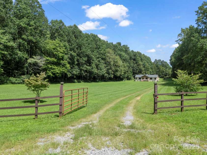 3540 Fork Creek Road, Saluda, NC 28773.  MLS# CAR4294391, YatesRealty ID 25602. Welcome Home! One of the only level spacious yards in Saluda with this acreage and usable land... wait until you see it! Prove me wrong... LOL