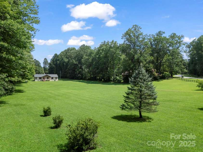 3540 Fork Creek Road, Saluda, NC 28773.  MLS# CAR4294391, YatesRealty ID 25602. Welcome Home! One of the only level spacious yards in Saluda with this acreage and usable land... wait until you see it! Prove me wrong... LOL