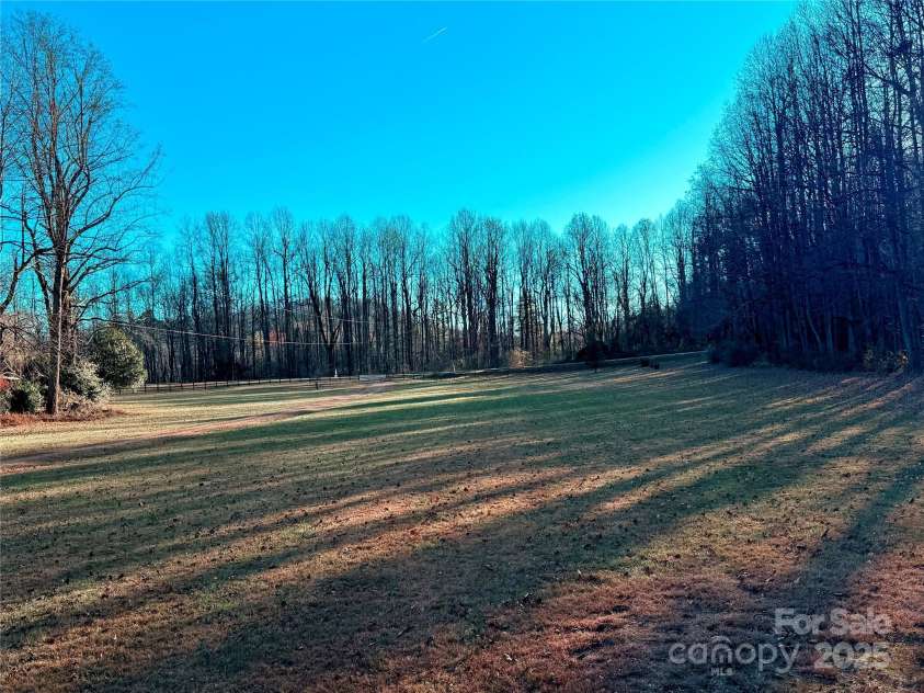 3540 Fork Creek Road, Saluda, NC 28773.  MLS# CAR4294391, YatesRealty ID 25602. Winter mountain views looking off the front porch across your amazing front yard!