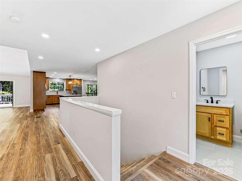 15 Josie Lane, Asheville, NC 28804.  MLS# CAR4267663, YatesRealty ID 25606. From main entry; half bath to right