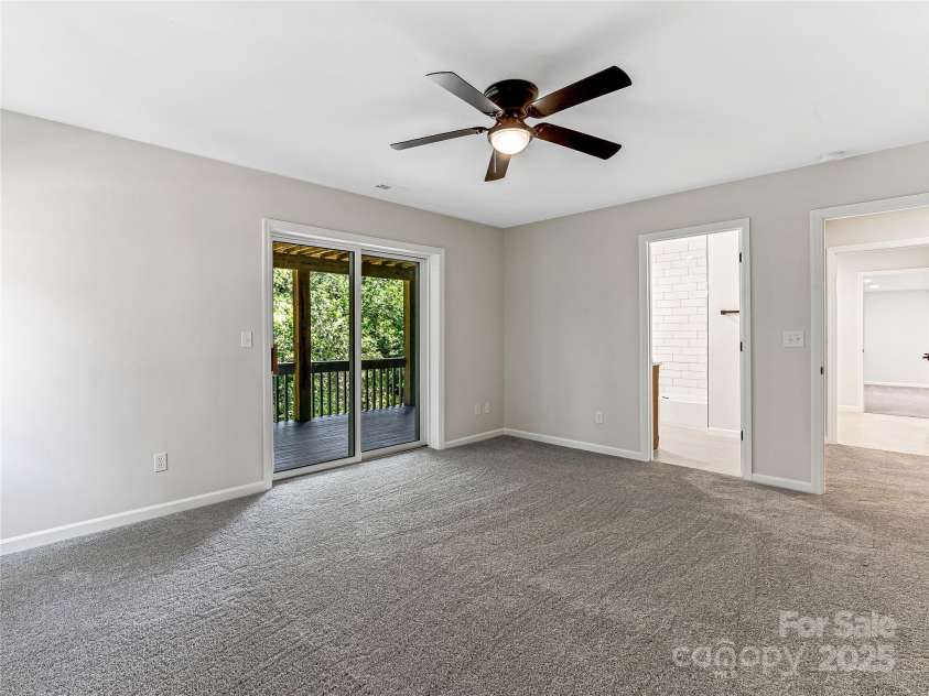 15 Josie Lane, Asheville, NC 28804.  MLS# CAR4267663, YatesRealty ID 25606. Lower level bedrooom
