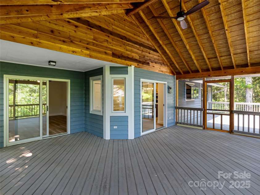 15 Josie Lane, Asheville, NC 28804.  MLS# CAR4267663, YatesRealty ID 25606. Screened porch accessible from kitchen or primary suite