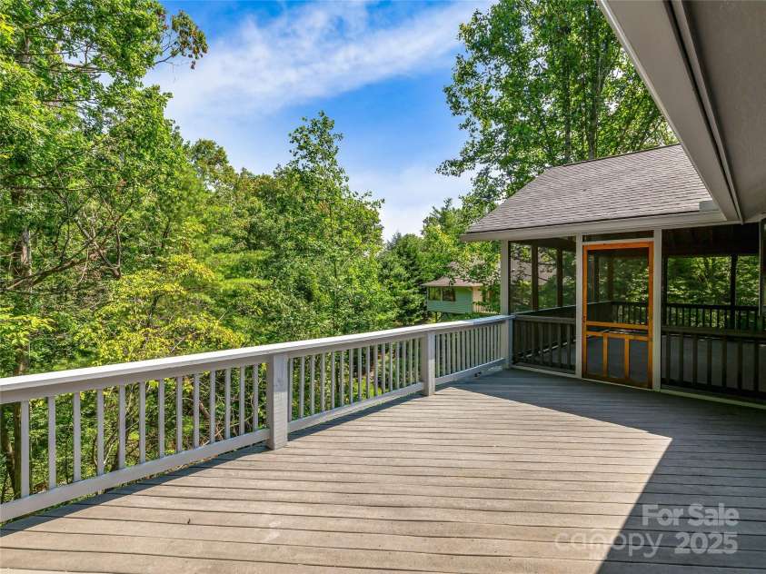 15 Josie Lane, Asheville, NC 28804.  MLS# CAR4267663, YatesRealty ID 25606. Upper deck accessed from screened porch or living room