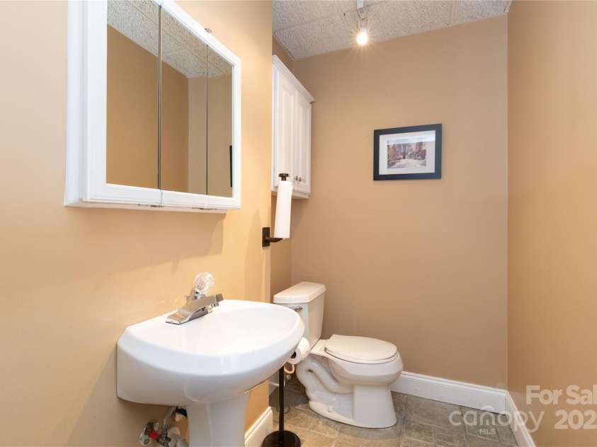 22 Robinhood Road, Asheville, NC 28804.  MLS# CAR4247044, YatesRealty ID 25607. 1/2 Bath Lower Level