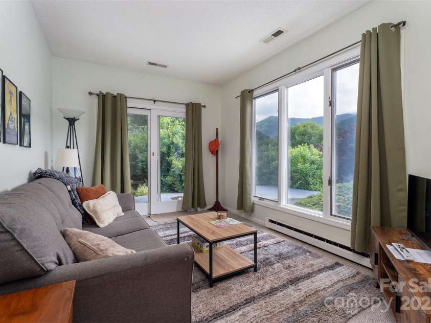 12 Apple Tree Way, Asheville, NC 28805.  MLS# CAR4274426, YatesRealty ID 25608. Apartment Living Room