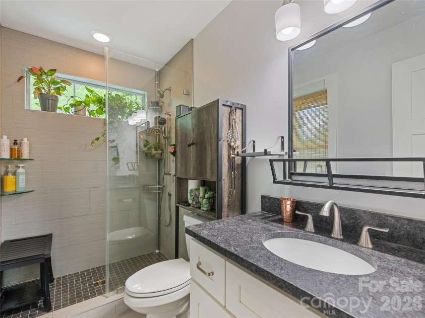 221 Northside Street, Canton, NC 28716.  MLS# CAR4378671, YatesRealty ID 25609. Primary bathroom provides a spa like setting