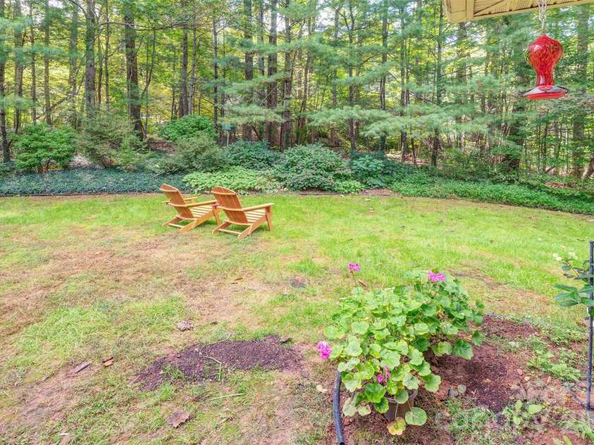 3 Sunningdale Drive, Flat Rock, NC 28731.  MLS# CAR4371560, YatesRealty ID 25611. Backyard