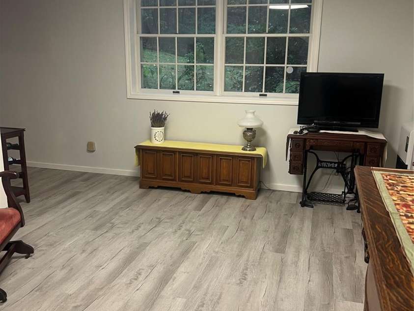 3 Sunningdale Drive, Flat Rock, NC 28731.  MLS# CAR4371560, YatesRealty ID 25611. Finished room in basement