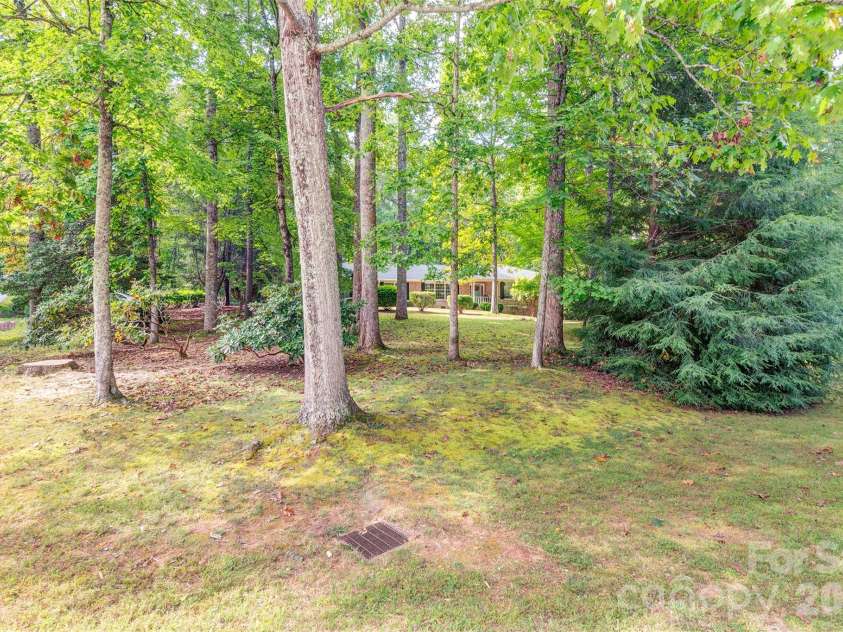 3 Sunningdale Drive, Flat Rock, NC 28731.  MLS# CAR4371560, YatesRealty ID 25611. View from road