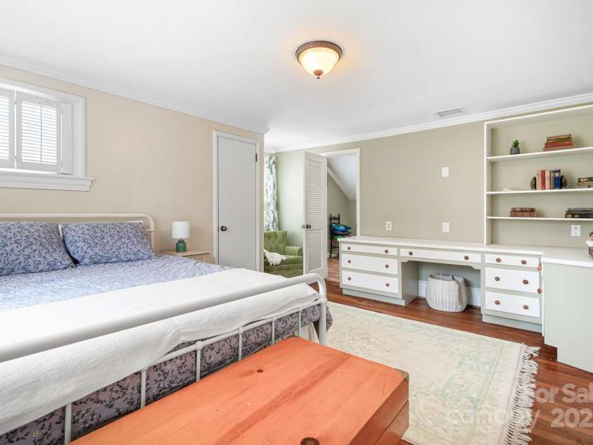 329 Oakwood Drive, Statesville, NC 28677.  MLS# CAR4227949, YatesRealty ID 25616. Upstairs second bedroom showing built-ins