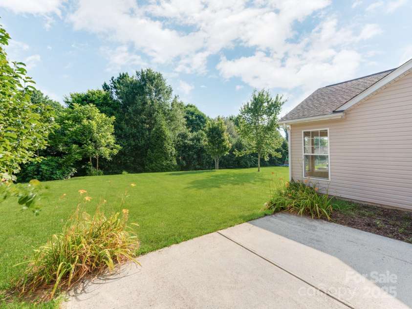 15001 Rosemary Way Drive, Huntersville, NC 28078.  MLS# CAR4260853, YatesRealty ID 25624. Large backyard patio