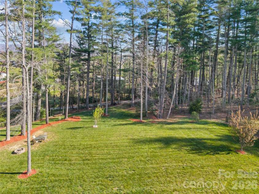 27 Pounding Mill Road, Hendersonville, NC 28792.  MLS# CAR4365219, YatesRealty ID 25624. Back yard
