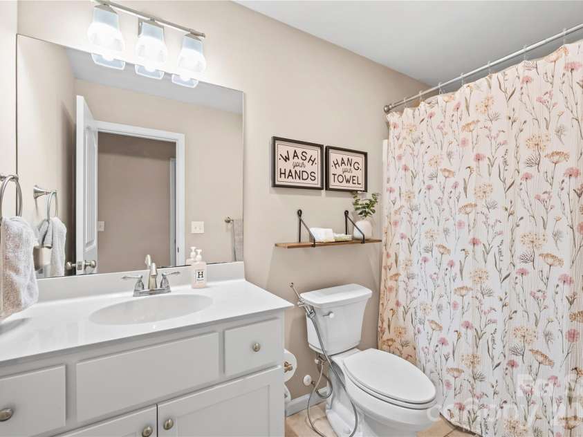 27 Pounding Mill Road, Hendersonville, NC 28792.  MLS# CAR4365219, YatesRealty ID 25624. Full guest bathroom
