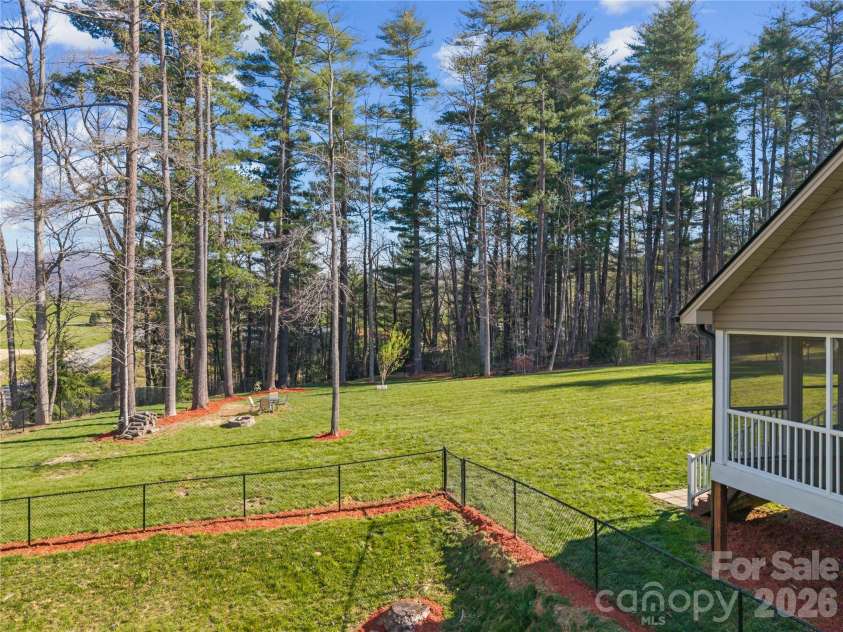 27 Pounding Mill Road, Hendersonville, NC 28792.  MLS# CAR4365219, YatesRealty ID 25624. Massive fenced in back yard.