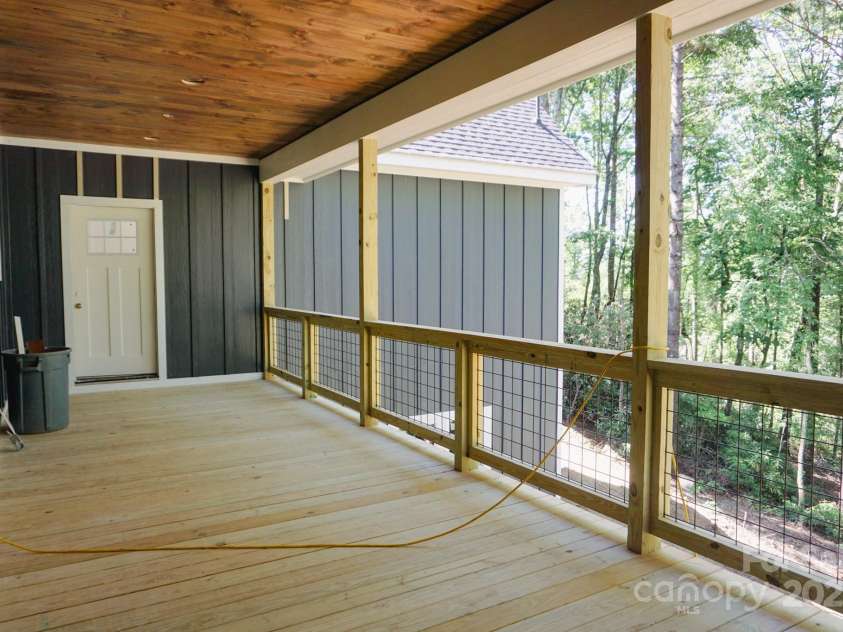 73 Summer Shade Court, Hendersonville, NC 28792.  MLS# CAR4272837, YatesRealty ID 25627. Onsite photo of back porch, to be screened