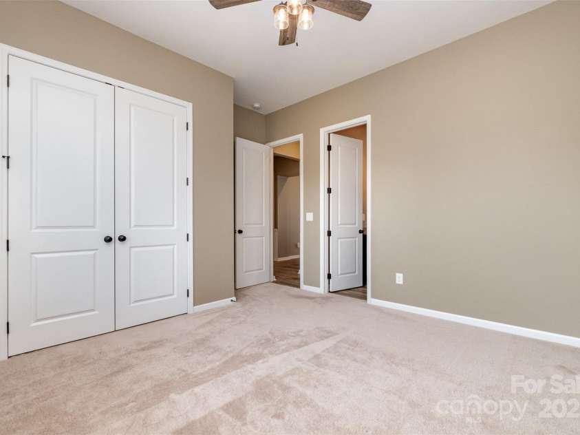 3105 Bonterra Boulevard, Indian Trail, NC 28079.  MLS# CAR4259704, YatesRealty ID 25628. Front bedroom