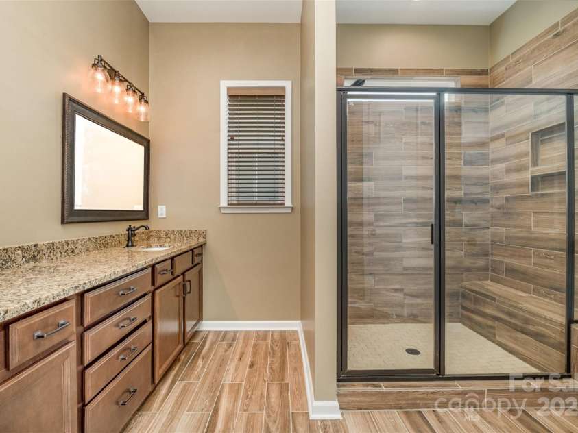 3105 Bonterra Boulevard, Indian Trail, NC 28079.  MLS# CAR4259704, YatesRealty ID 25628. Glass walk-in shower