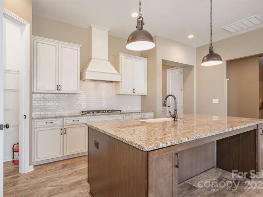 3105 Bonterra Boulevard, Indian Trail, NC 28079.  MLS# CAR4259704, YatesRealty ID 25628. Upgraded gas cooktop