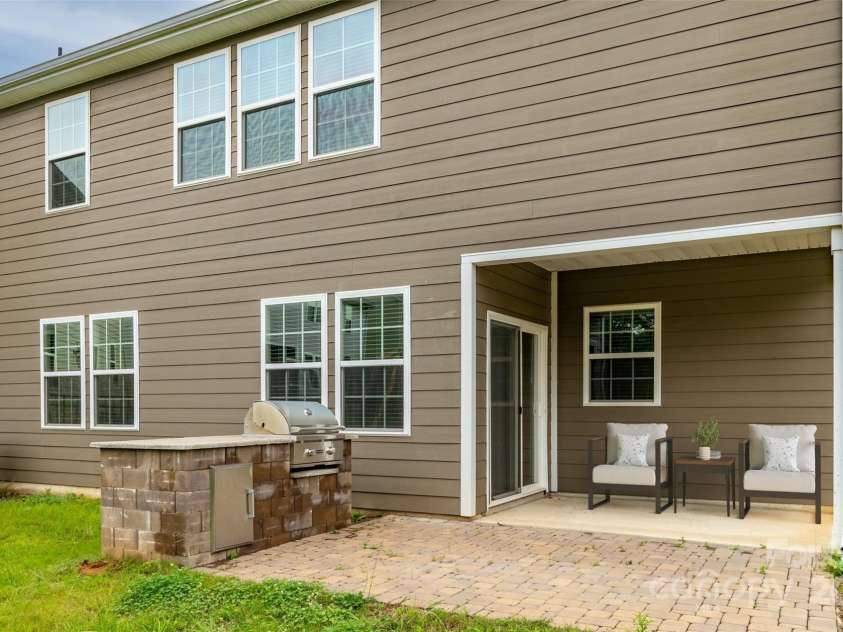 150 Morehouse Avenue, Mooresville, NC 28117.  MLS# CAR4264597, YatesRealty ID 25629. Stone Paver Patio And Built-In Grill
