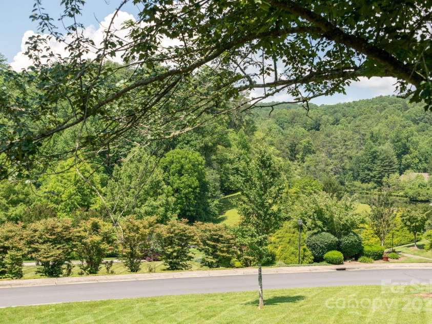 52 Quail Run Circle, Brevard, NC 28712.  MLS# CAR4274057, YatesRealty ID 25630. 