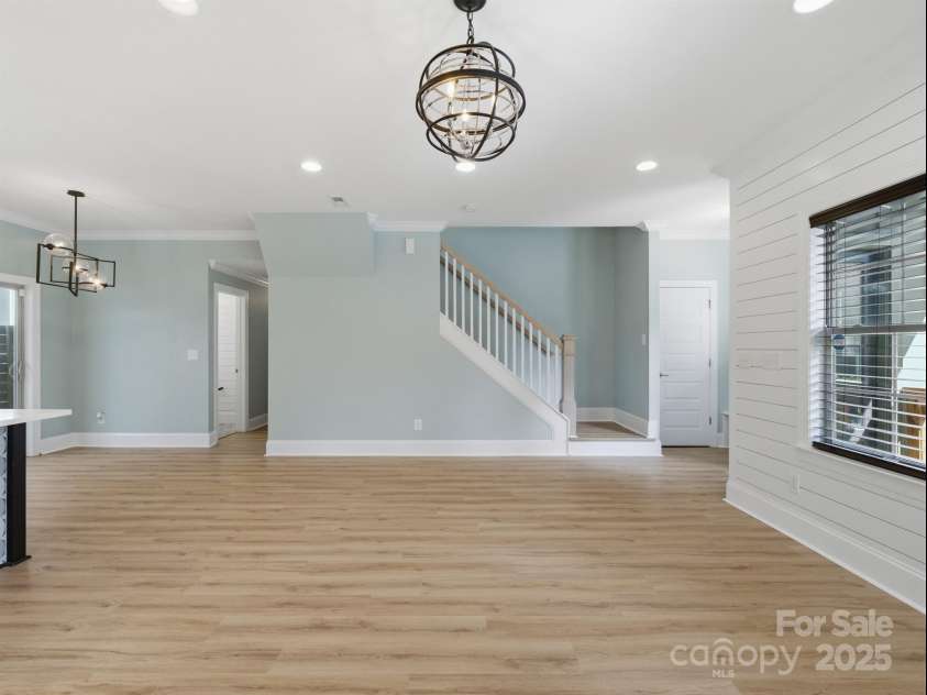 1511 Landis Avenue, Charlotte, NC 28205.  MLS# CAR4246720, YatesRealty ID 25633. View from den to stairs