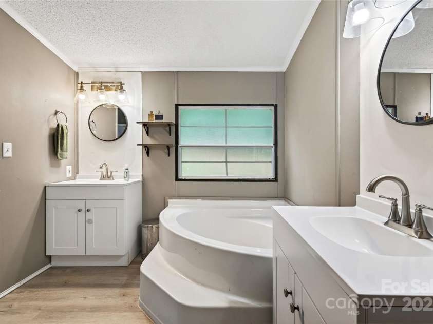 143 Diamond Cove, Nebo, NC 28761.  MLS# CAR4279762, YatesRealty ID 25637. Master Bathroom 2 sinks