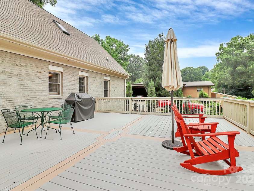 427 Lansdowne Road, Charlotte, NC 28270.  MLS# CAR4278701, YatesRealty ID 25638. Huge deck with composite decking overlooks beautiful back yard!