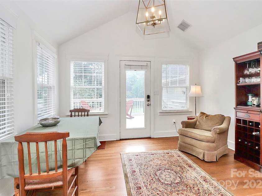 427 Lansdowne Road, Charlotte, NC 28270.  MLS# CAR4278701, YatesRealty ID 25638. Sunroom enters onto deck