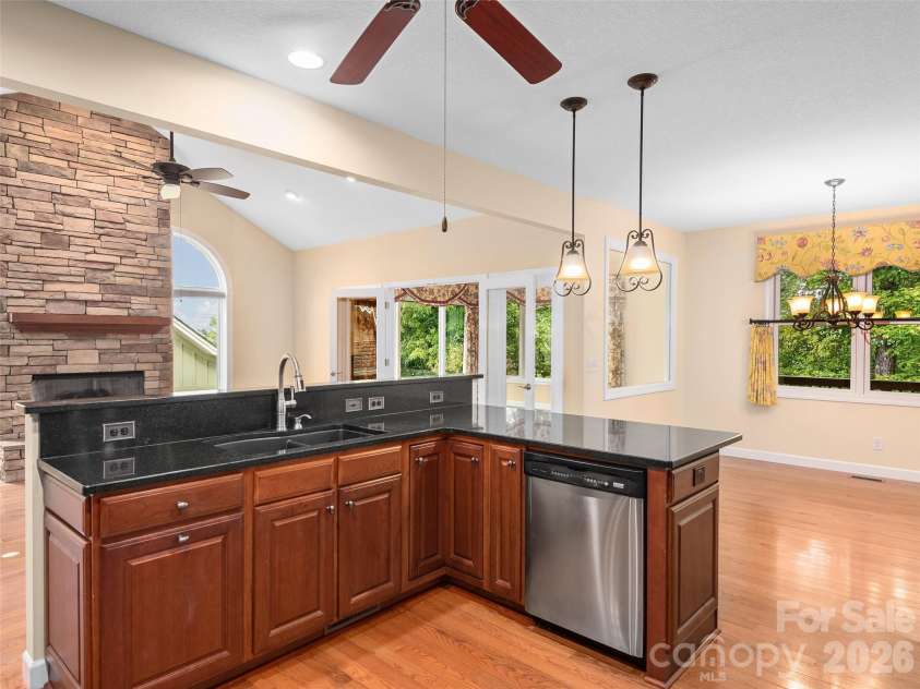 54 Deep Valley Lane, Hendersonville, NC 28791.  MLS# CAR4304196, YatesRealty ID 2564. Kitchen open to Great Room