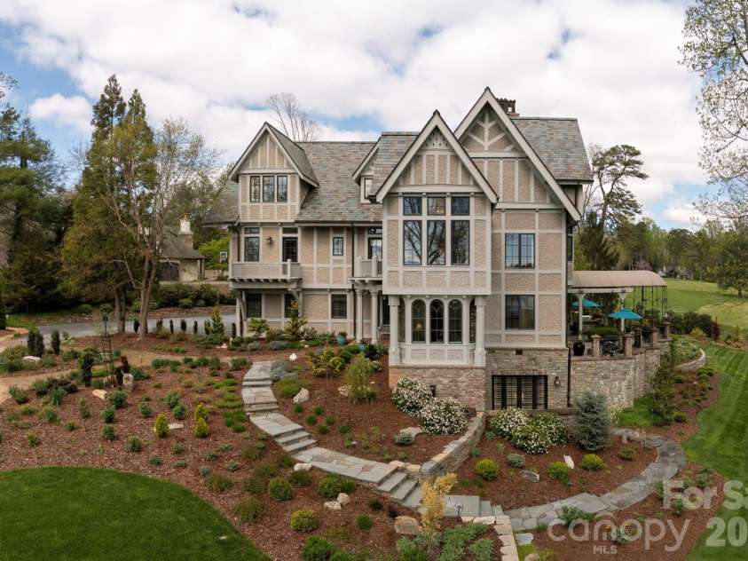 8 Fairway Place, Asheville, NC 28803.  MLS# CAR4245541, YatesRealty ID 2564. Estate home overlooking garden and golf course fairway