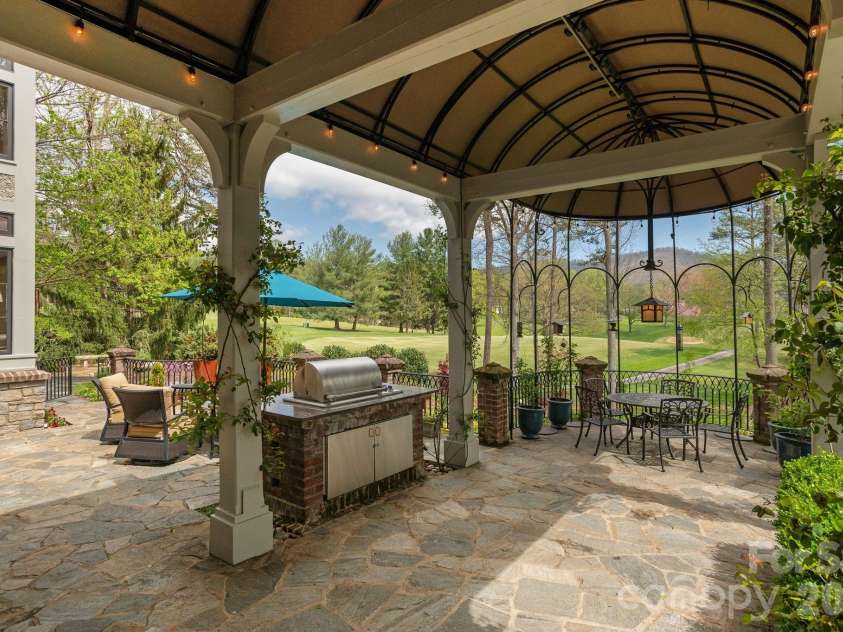 8 Fairway Place, Asheville, NC 28803.  MLS# CAR4245541, YatesRealty ID 2564. Expansive views of the adjacent golf course offer both beauty and tranquility right outside your door.