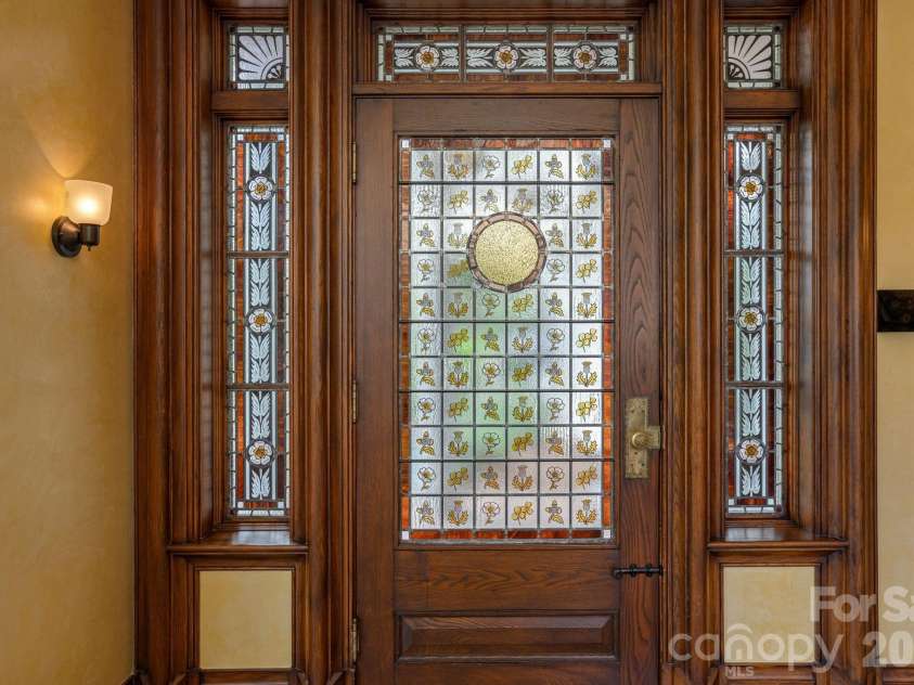 8 Fairway Place, Asheville, NC 28803.  MLS# CAR4245541, YatesRealty ID 2564. Leaded glass patterned after William Morris Arts and Crafts era artwork.