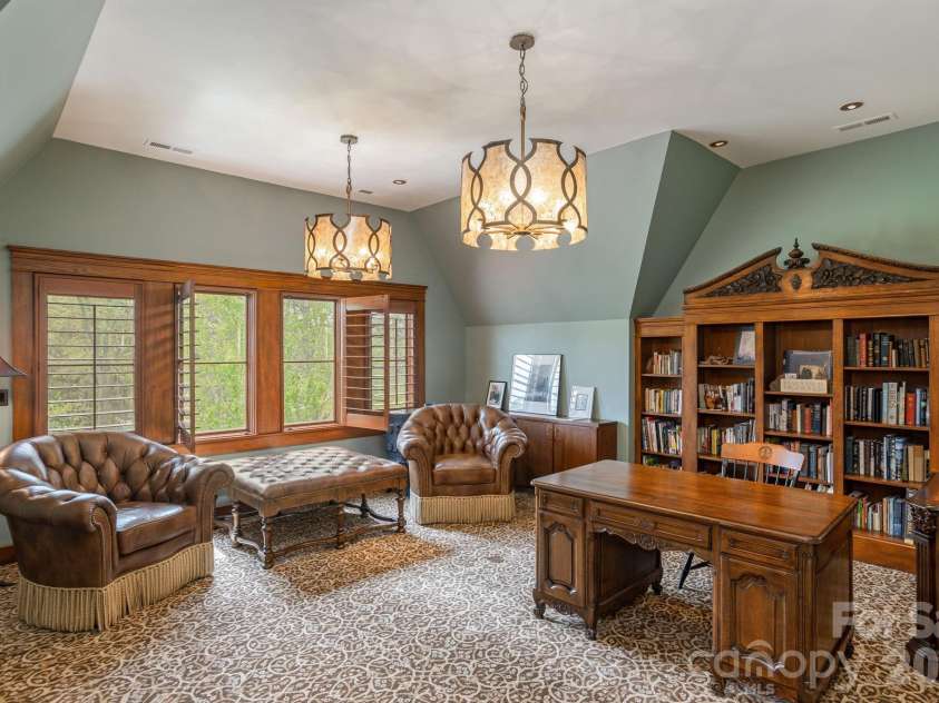 8 Fairway Place, Asheville, NC 28803.  MLS# CAR4245541, YatesRealty ID 2564. Library with views of the golf course.