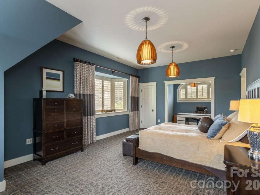8 Fairway Place, Asheville, NC 28803.  MLS# CAR4245541, YatesRealty ID 2564. Two spacious bedrooms, each with en-suite bathrooms and walk-in closets.