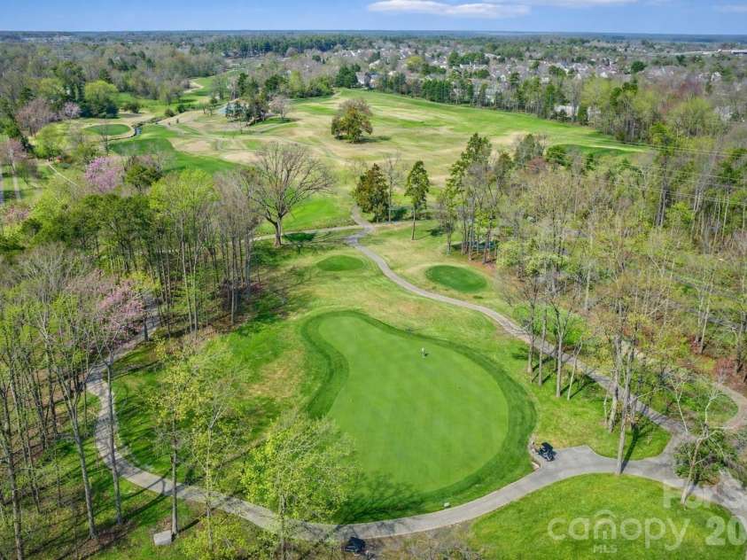 8348 Highland Glen Drive, Charlotte, NC 28269.  MLS# CAR4355382, YatesRealty ID 25649. Trees & grass have been enhanced to depict spring.