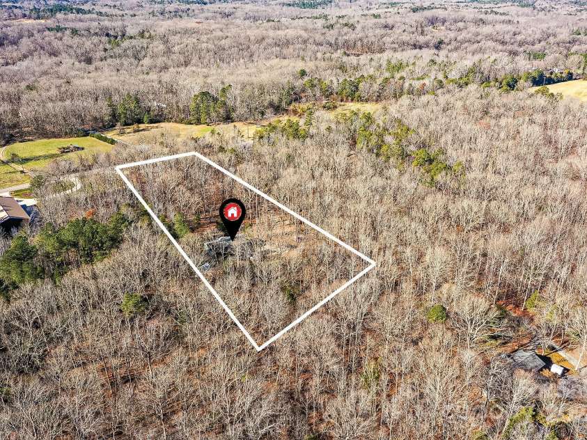 8327 Walkup Road, Waxhaw, NC 28173.  MLS# CAR4209160, YatesRealty ID 2565. Private Wooded Property
