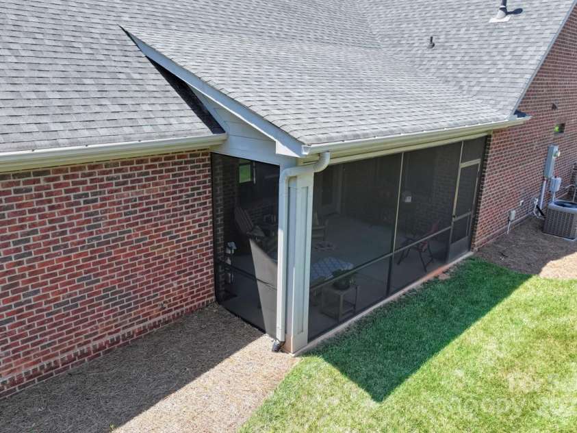 1150 Golden Hill Lane, Denver, NC 28037.  MLS# CAR4278089, YatesRealty ID 25650. Screen porch located on the side of the home